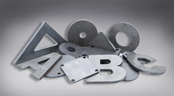 Manufactured metal parts including gussets, base plates, letters and numbers